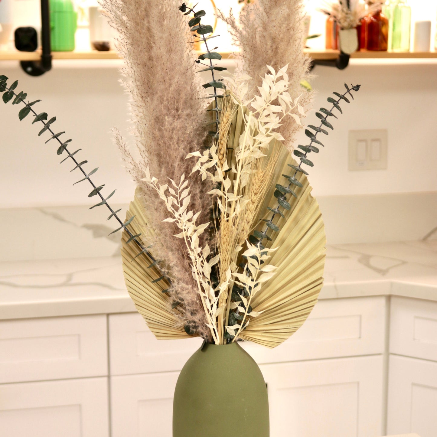 Dried Floral Arrangements in Green Vase
