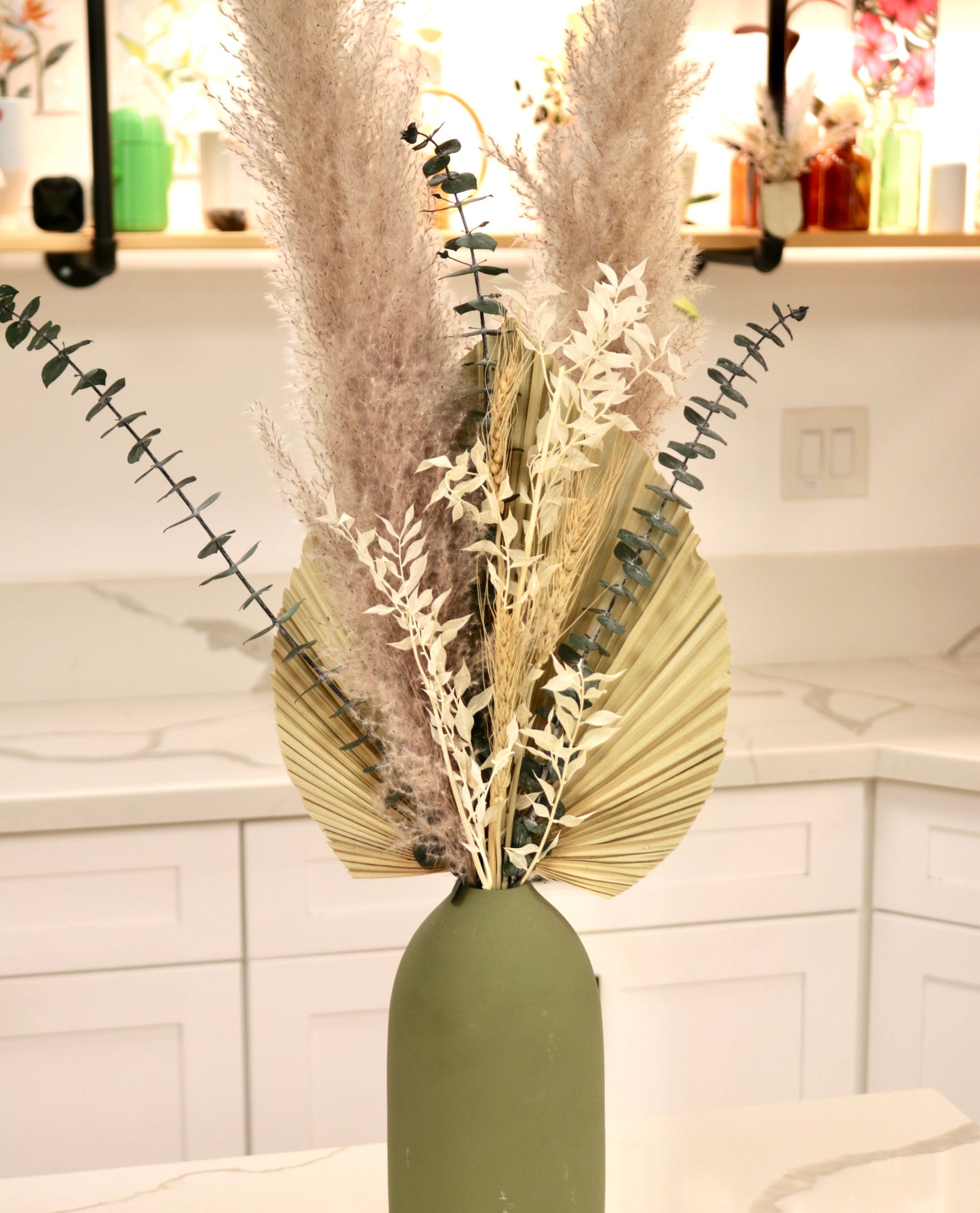 Dried Floral Arrangements in Green Vase